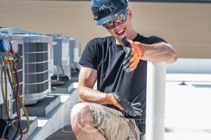 Likeable, happy, hvac technician smiling